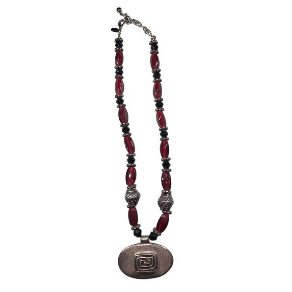 Chicos Red & Black Beaded Necklace With Oval Metal Pendant Swirl design - Picture 2 of 6